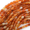 6x9mm natural orange red carnelian drum barrel beads 15