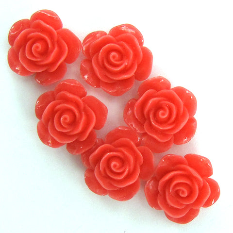 12mm synthetic coral carved chrysanthemum flower earring pair magenta