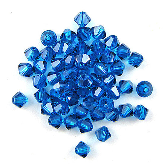 24 4mm Swarovski crystal xilion bicone 5328 Capri blue