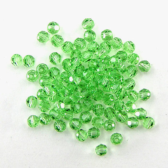 12 4mm Swarovski crystal round 5000 Peridot