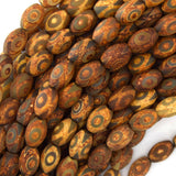11mm - 12mm matte brown Tibetan DZI agate barrel beads 15