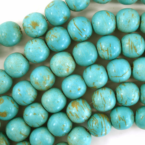 18mm blue turquoise carved skull beads 15" strand