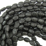 14mm black volcano lava flat oval beads 15.5