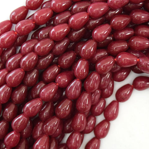 18mm ruby zoisite pressed jade flat oval 15.5" strand